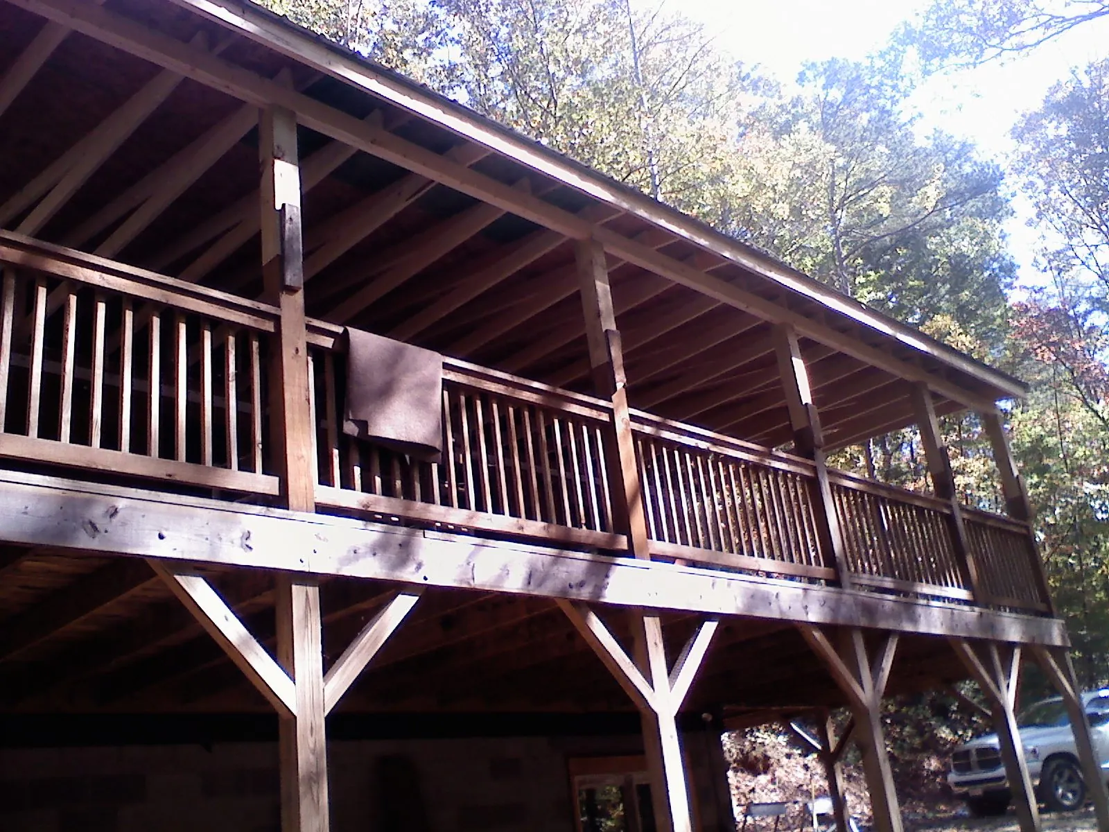 Timber framing under a new elevated porch and deck — Roof Leak Repair in Esmond by Roofing Brothers